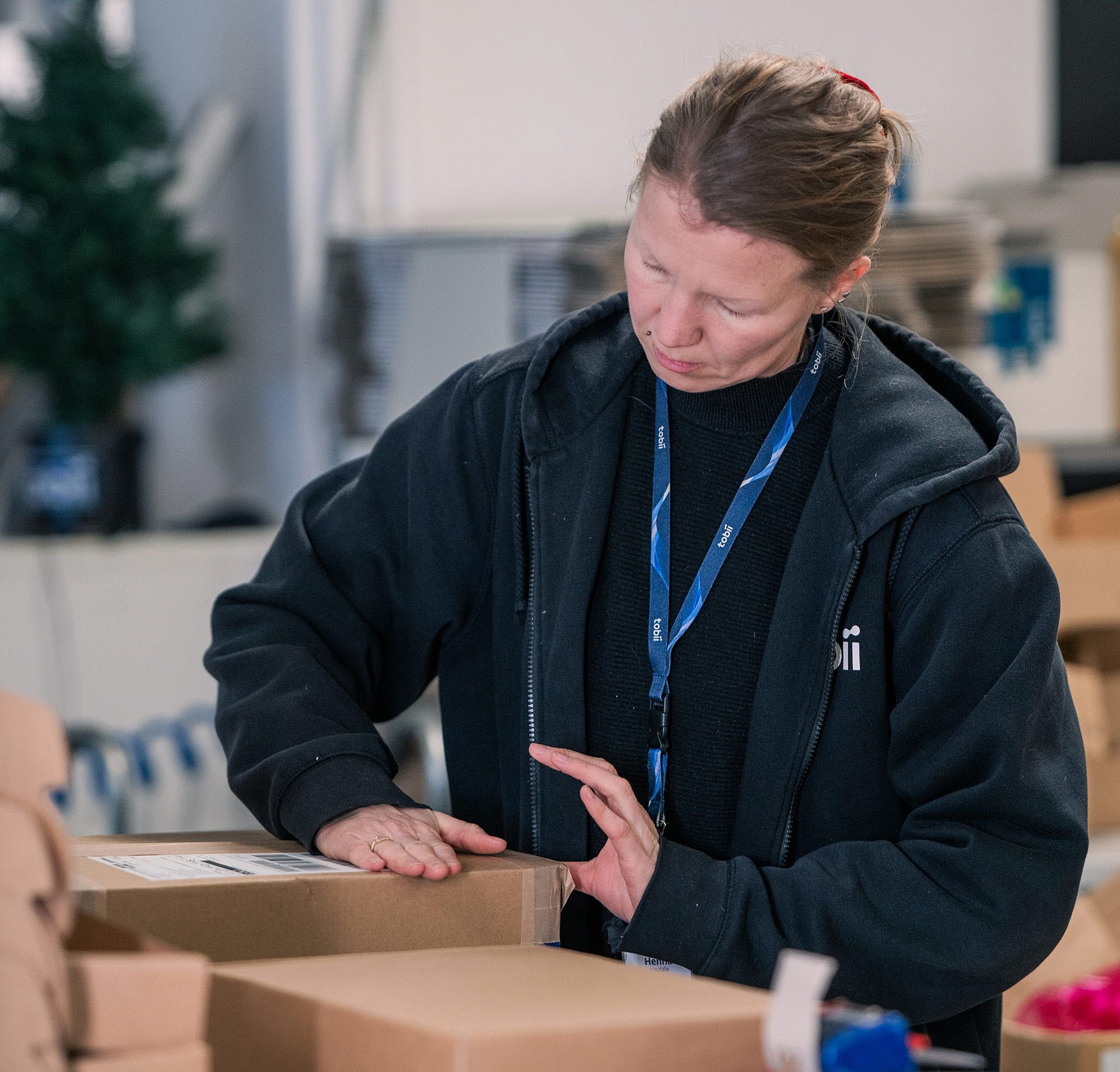 A woman packing boxes