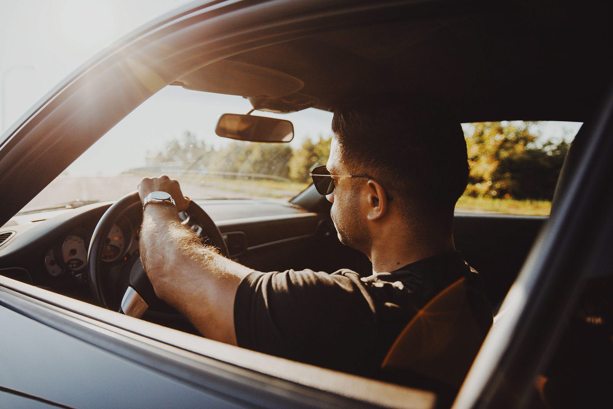 Man driving a car